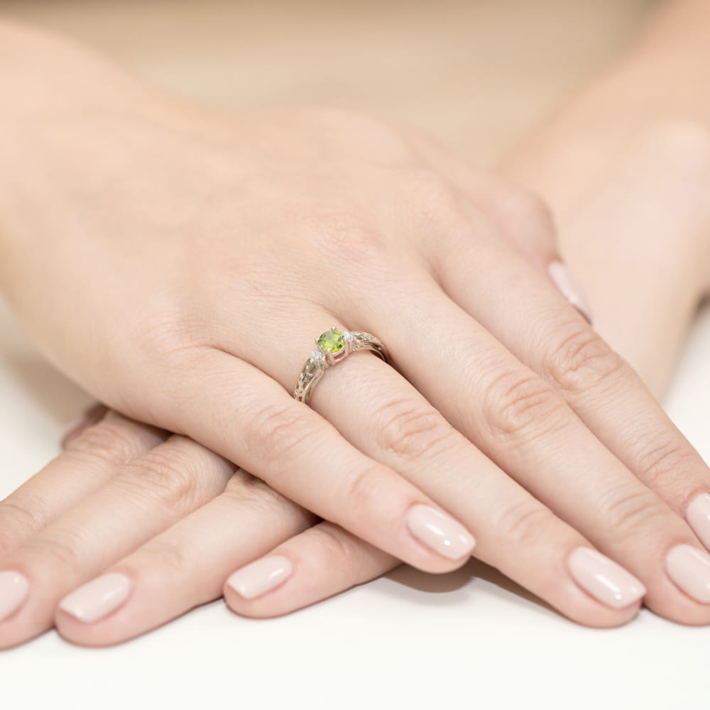 Inel Aur 9K cu Peridot 0.60 ct si Diamante Naturale 0.02 ct