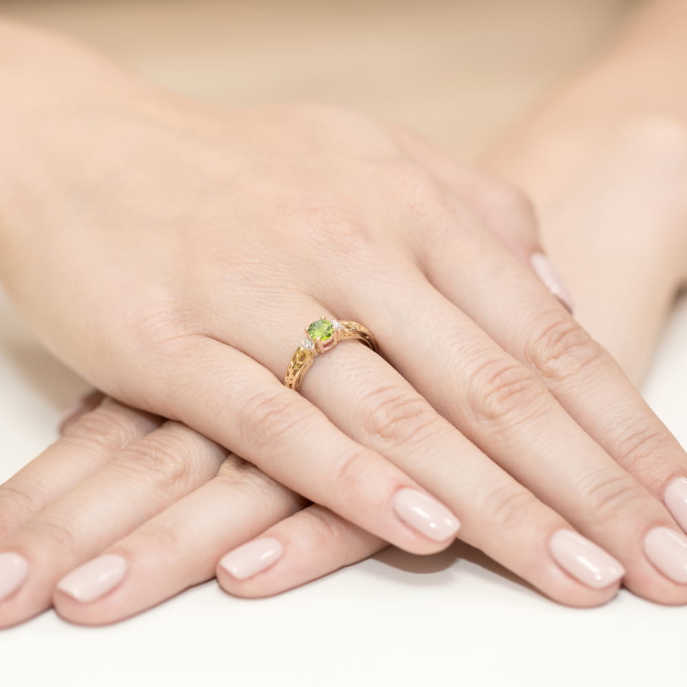 Inel Aur 9K cu Peridot 0.60 ct si Diamante Naturale 0.02 ct