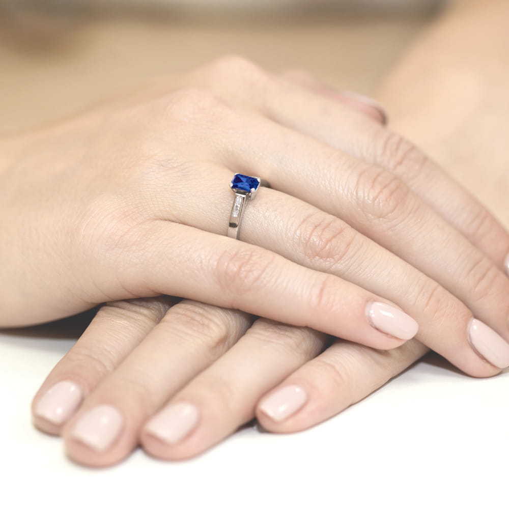 Inel Aur 9K cu Safir 0.60 ct si Diamante Naturale 0.04 ct