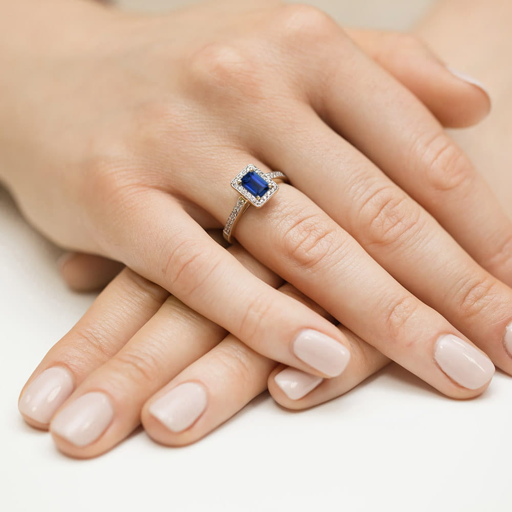 Inel Aur 9K cu Safir 0.60 ct si Diamante Naturale 0.22 ct