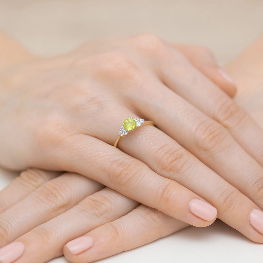 Inel Aur 9K cu Peridot 0.60 ct si Diamante Naturale 0.18 ct